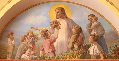 VIENNA, AUSTIRA - JUNI 18, 2021: The fresco of Jesus among the children in Herz Jesu church from...