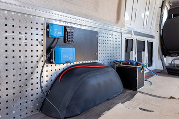 Electrical control units for solar panels inside a camper van
