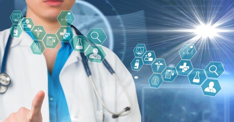 Medical icons against mid section of female doctor touching invisible screen against blue background - Powered by Adobe