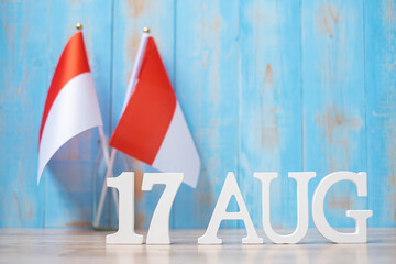 Wooden text of August 17th with miniature Indonesia flags. Indonesia independence day, National...