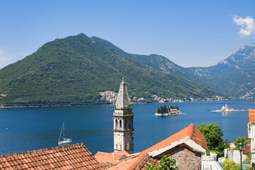 Fototapeta na wymiar Panoramic view of the city, islands and bay on the sunny day. Perast. Montenegro.