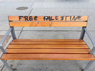 Free Palestine writing on the bench