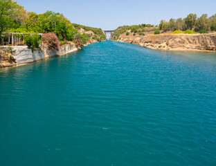 Obraz na płótnie Canvas Panoramic view from the immersion bridge in Isthmia to the Entrance to the Corinth Canal from the Saronic Gulf in the Peloponnese in Greece