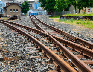 low angle view of a railroad junction of a narrow gauge railroad in Germany