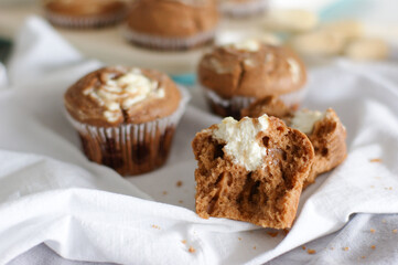 Chocolate cupcakes with a curd cheese cap. Mini cakes with cottage cheese and coconut cream.