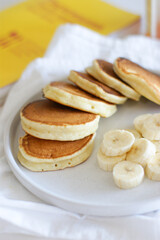 Delicious and fluffy pancakes for breakfast with banana and condensed milk.