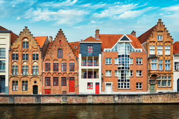 Naklejka premium Brugge canal and old houses. Bruges, Belgium