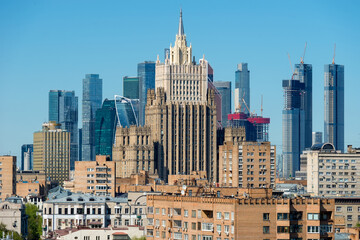 Naklejka premium View of the building of the Ministry of Foreign Affairs of the Russian Federation and the Moscow City business center on a sunny day. Famous tourist places. Moscow, Russia