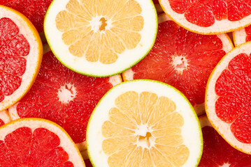 Pomelo and grapefruit slices background.