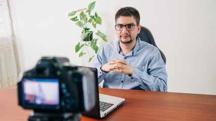 man streaming, explaining work stuff for his followers