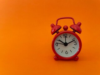 alarm clock isolated on colored background
