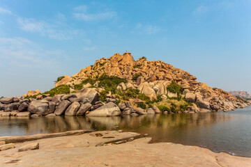 Big boulders and rocks along the Chakrairtha Lake in Hampi, Karnataka, South India - Asia