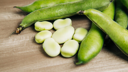broad beans on a wooden base, these are crops from the boyacense region of colombia.