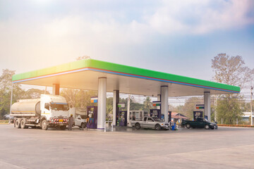 Gas fuel station with clouds sky and sun light