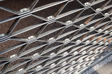 Shop window protected by iron grilles