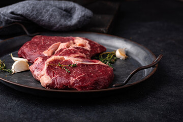 Raw uncooked rib eye steak