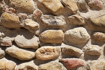 Stone wall background close-up