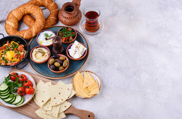 Traditional Turkish breakfast with meze and simit