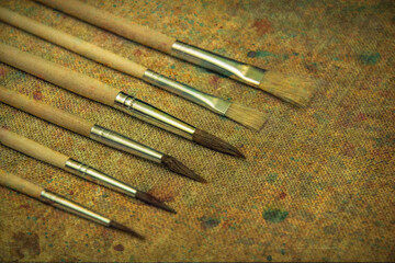 Brushes for drawing on a background of a canvas	