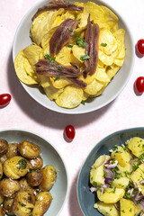 Assortment of potato, fried, cooked, chips and french fries snacks