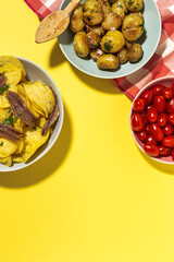 Assortment of potato, fried, cooked, chips and french fries snacks