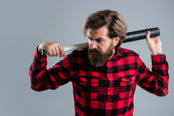 brutal man with baseball bat express aggression or play game, sport