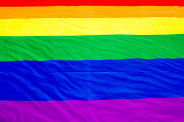 Rainbow flag, a symbol for the LGBT community on the ground