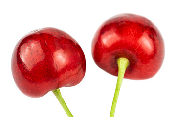 Fresh red sweet cherry close-up isolated on white background.
