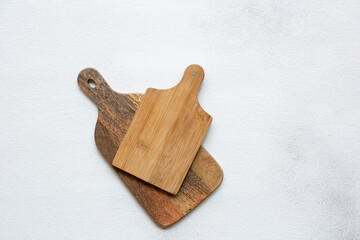 Restaurant concept - kitchen boards on white background, top view, flat