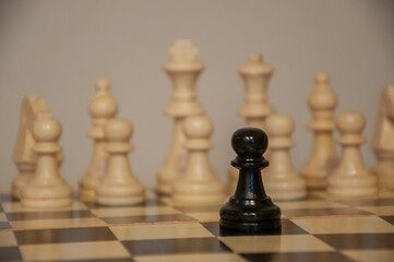 One against all, black versus white, chess, confrontation 