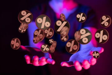 sale digital percent in hand.