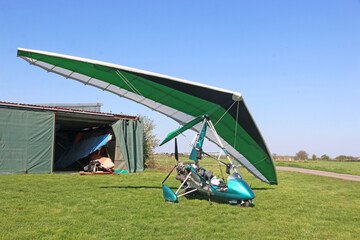 Ultralight airplane on a grass airfield