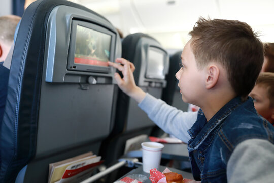 Child turns on multimedia system on board aircraft