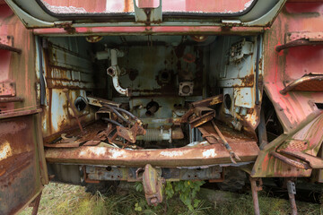 Fototapeta na wymiar Old firetruck, Buryakovka radioactive vehicles graveyard in Chernobyl
