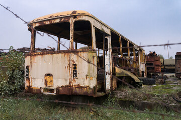 Fototapeta na wymiar Old rusty bus, Buryakovka radioactive vehicles graveyard