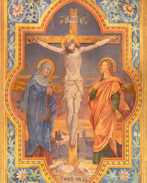 VIENNA, AUSTIRA - JUNI 24, 2021: The fresco of Crucifixion in the Votivkirche church by brothers Carl and Franz Jobst (sc. half of 19. cent.).