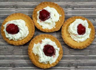 Cake with whipped cream and berries. Dessert.