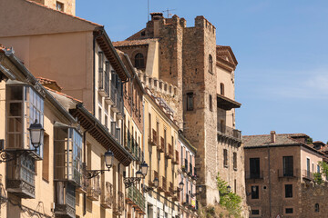 Fototapeta na wymiar View of some of the emblematic buildings of Segovia next to the Casa de los Marqueses de Lozoya, San Juan street