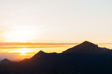 Naklejka premium Mountain Landscape. Panoramic View Of Mountains Against Sky During Sunset