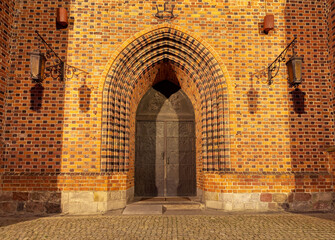 Poznan. Ancient wooden gate to the cathedral.