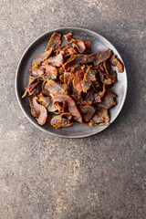 Sliced beef jerky. Dried beef meat.