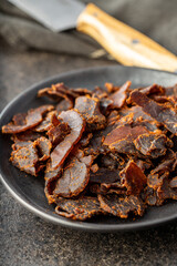 Sliced beef jerky. Dried beef meat.