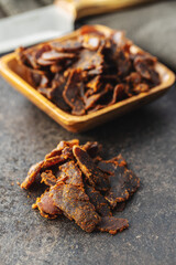 Sliced beef jerky. Dried beef meat.