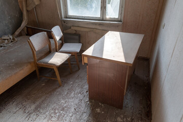 Old furniture in apartment of ghost town Pripyat