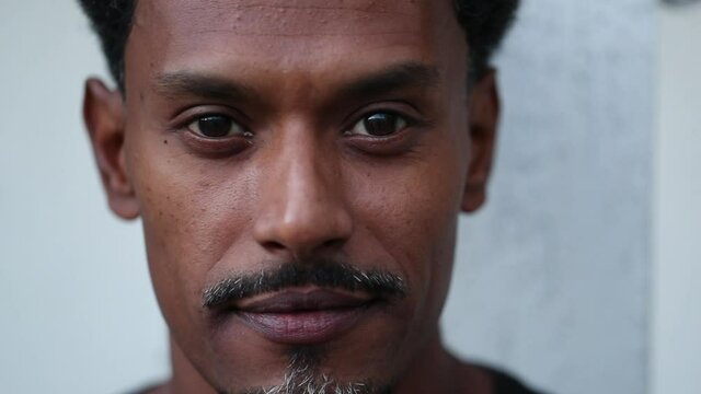 Confident black man portrait face, positive African person