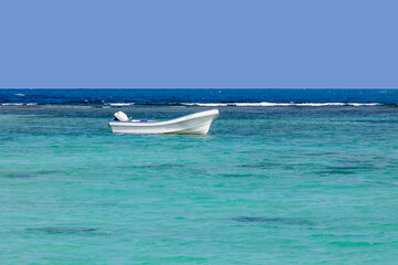 Boat on the venezuelan caribbean coast of morrocoy national park - Powered by Adobe