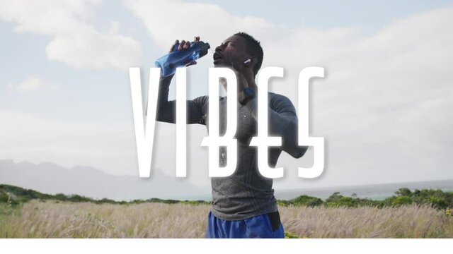 Animation of the word vibes written in white over man exercisng in countryside drinking water