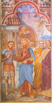 VIENNA, AUSTIRA - JUNI 24, 2021: The fresco of Healing the centurion's servant in the Votivkirche church by brothers Carl and Franz Jobst (sc. half of 19. cent.).