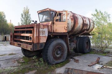 Old rusty truck near ghost town Pripyat