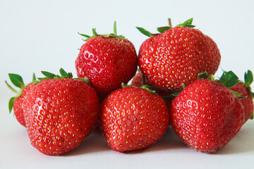 Red ripe strawberries background. Close-up